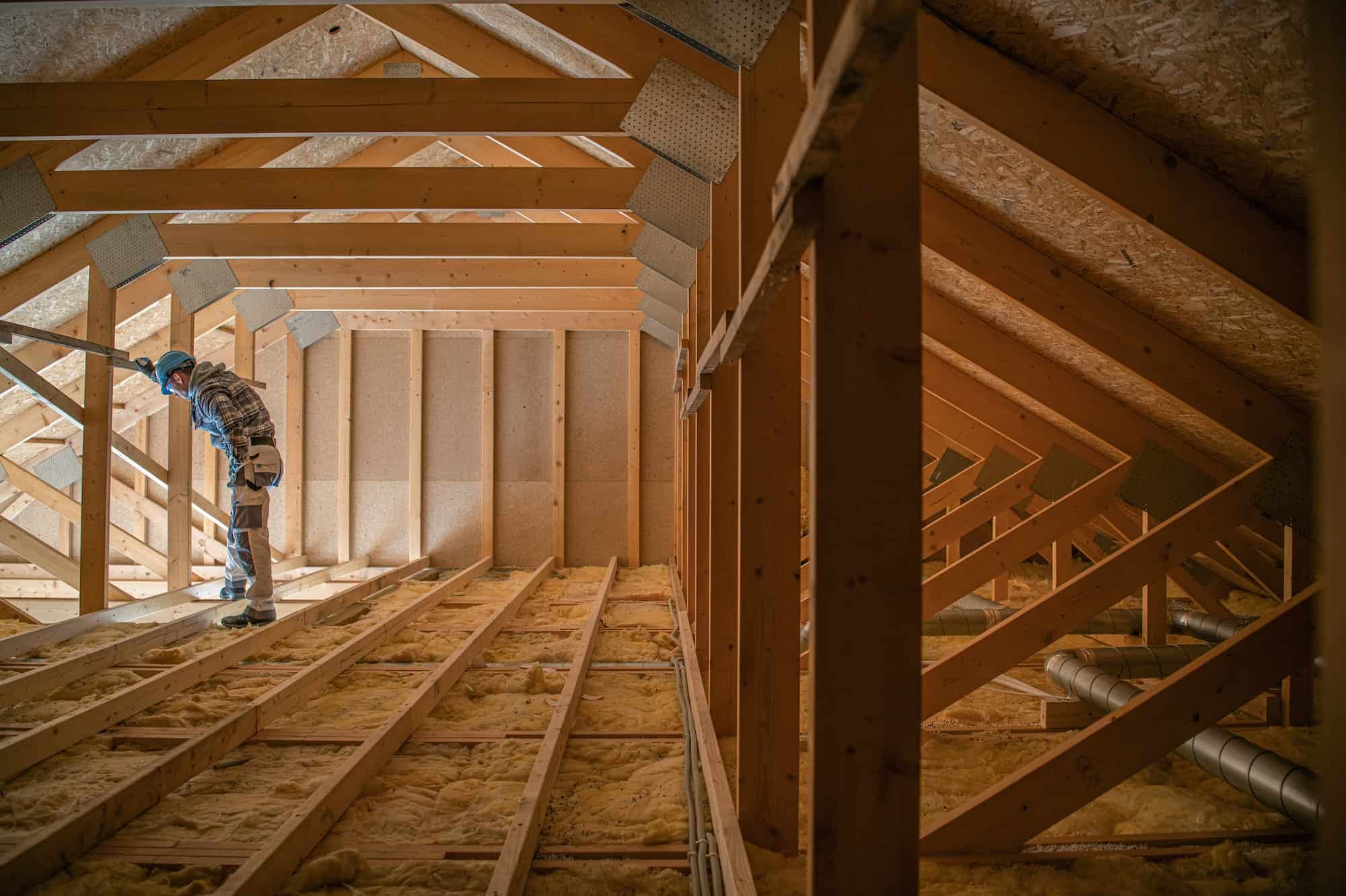 Attic view of timber rafters and underlay on a Cork home, checked for daylight and damp before a felt strip-back