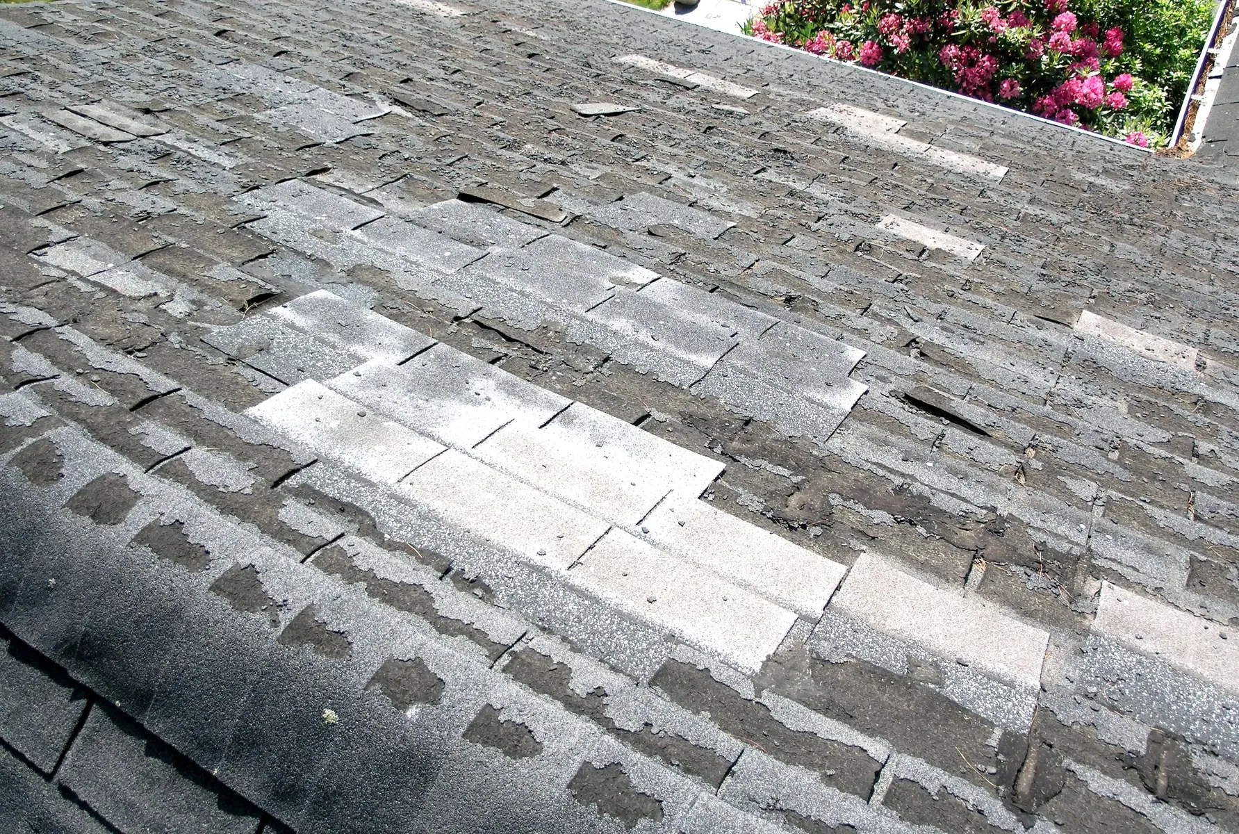 Emergency roof work in progress on a Cork home, tarp and battens temporarily securing a storm-damaged slope
